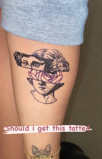 reviewer photo of an abstract tattoo of a woman's head drawn with the markers