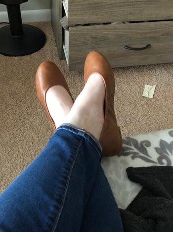 Reviewer photo of the dark tan ballet flats