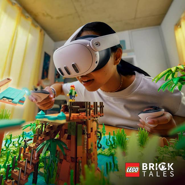 a child model wearing the headset and peering over an jungle scape made of legos 