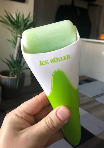 another reviewer holding the green ice roller