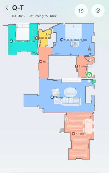 Floor plan with labeled areas: guest bedroom, master bedroom, hall, living room, kitchen, and bathroom