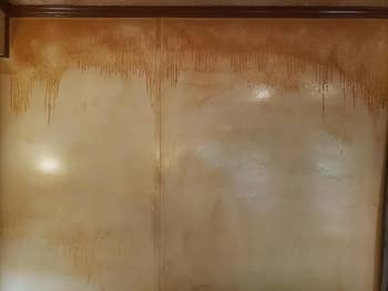 Wall with extended  yellowing owed  to a smoker surviving  successful  the house