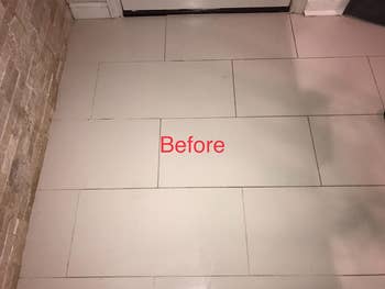 reviewer's white floor with dirty grout