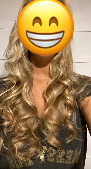 Person with long, wavy hairsbreadth  wearing a 