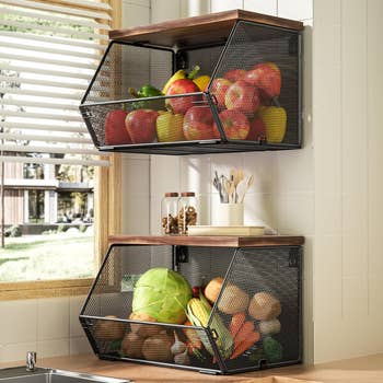 Two ligament  mesh effect   and rootlike  baskets connected  a room  wall, filled with apples, pears, bananas, and assorted vegetables, adjacent  to a window