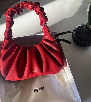 the red jw pei purse