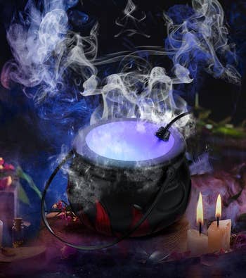 the same cauldron fogging up with blue light
