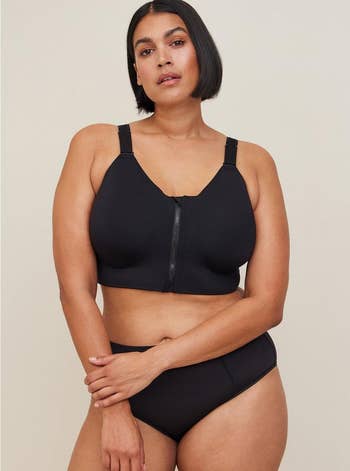 a model posing in black