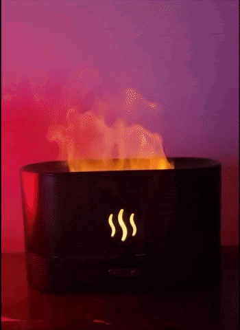 A humidifier emits LED lights resembling flames, creating a cozy ambiance
