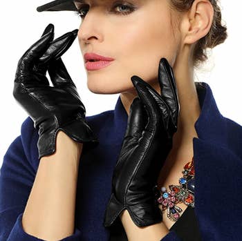 a model wearing the gloves in black
