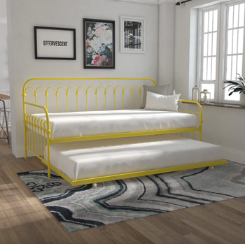 yellow metal trundle bed