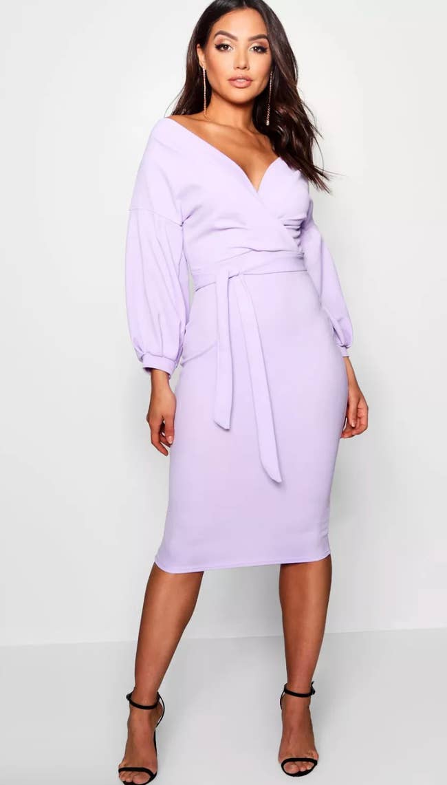 Model wearing purple dress