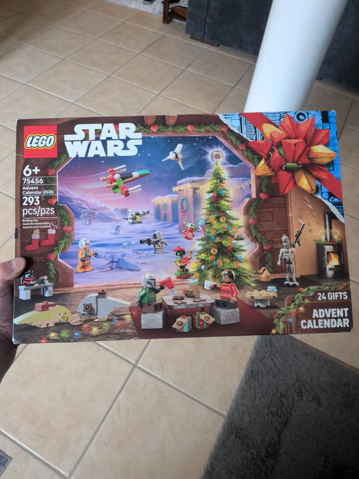 Lego Star Wars Advent Calendar box, featuring assorted  mini figures and a vacation  scene. Suitable for ages 6+, with 293 pieces