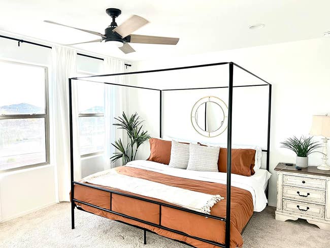 reviewer's canopy bed frame in black