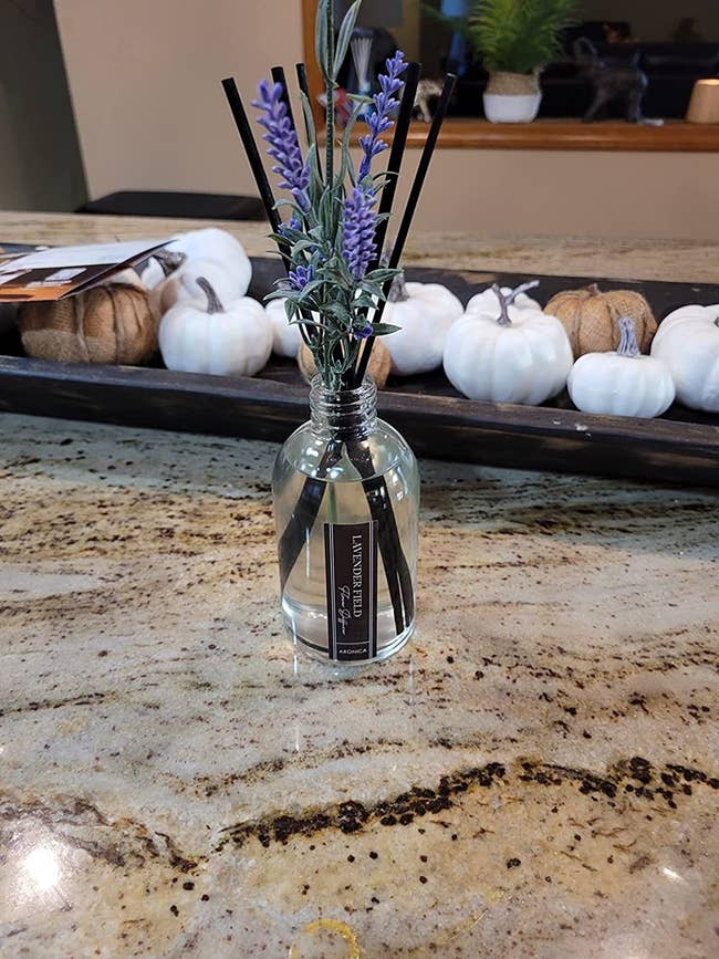 reviewer image of the reed diffuser on a marble surface