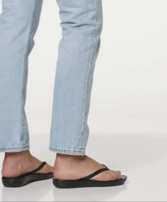 gif of exemplary  wearing the achromatic  sandals