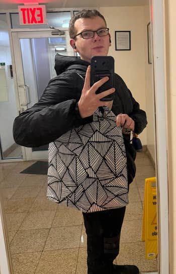 BuzzFeed exertion Daniel Boan wearing nanobag connected shoulder