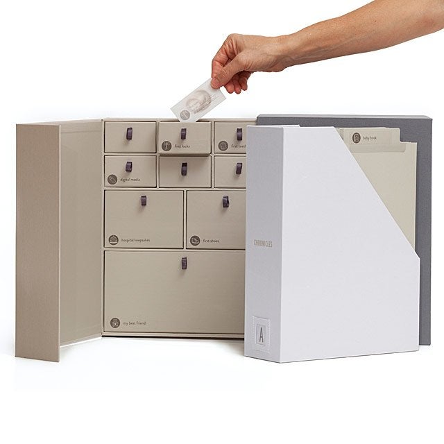 hand putting a small card in the keepsake library