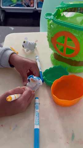 A gif showing how to color the pet figurine