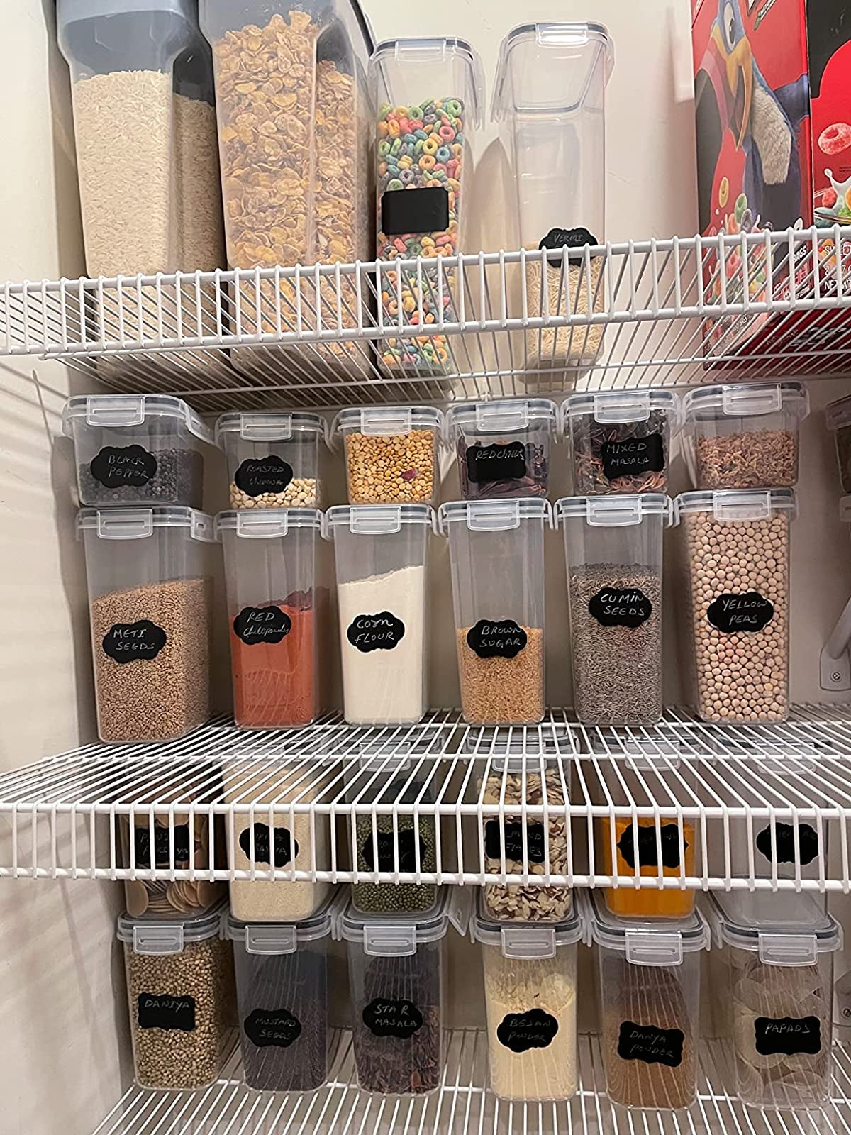 a reviewer's pantry filled with containers that are neatly labeld