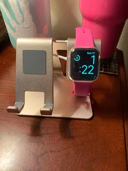 reviewer photo of 2-in-1 stand with apple watch on it