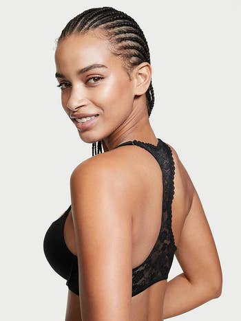 back view of same model wearing the bra with black racerback