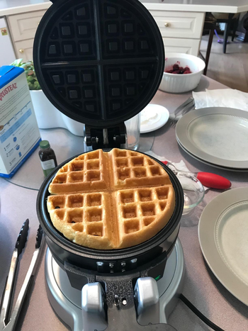 Reviewer image of waffle in black and silver waffle maker