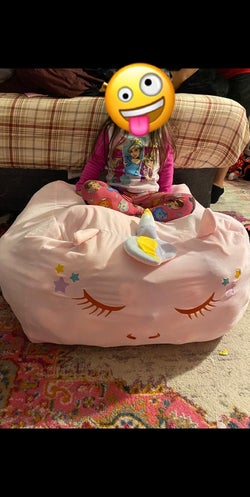 Reviewer's child sitting on the bean bag