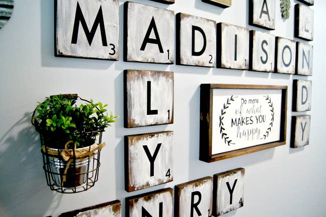 wall with large Scrabble tile style squares up as wall decor