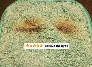 A used cloth with makeup on it and five-star review text 