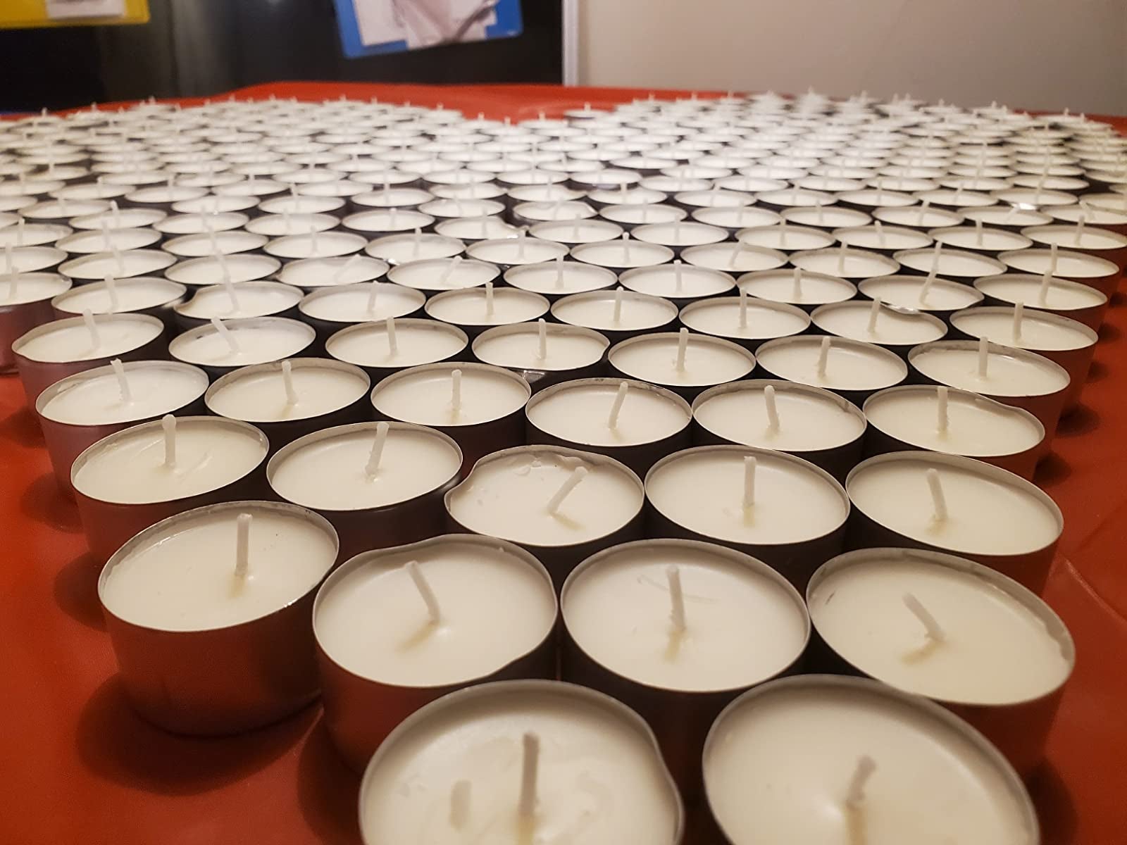 reviewer photo of an array of white tea light candles