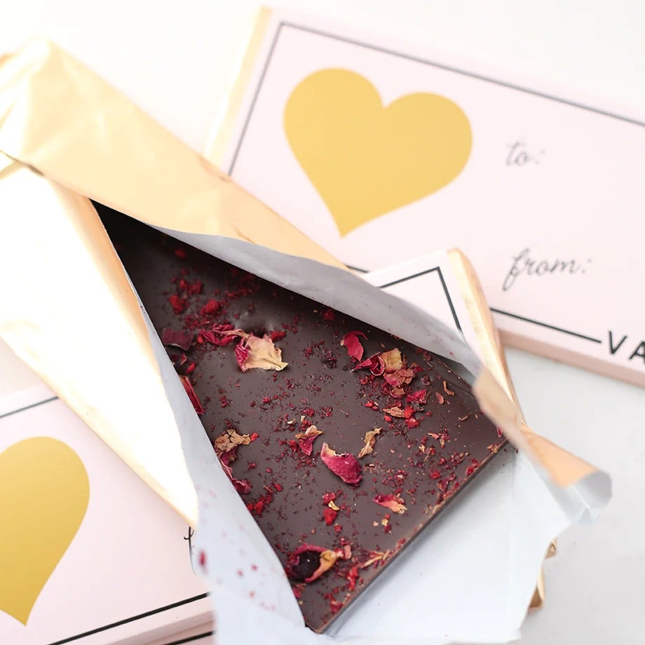 the chocolate bar studded with dried raspberry and rose petals in valentine's day packaging