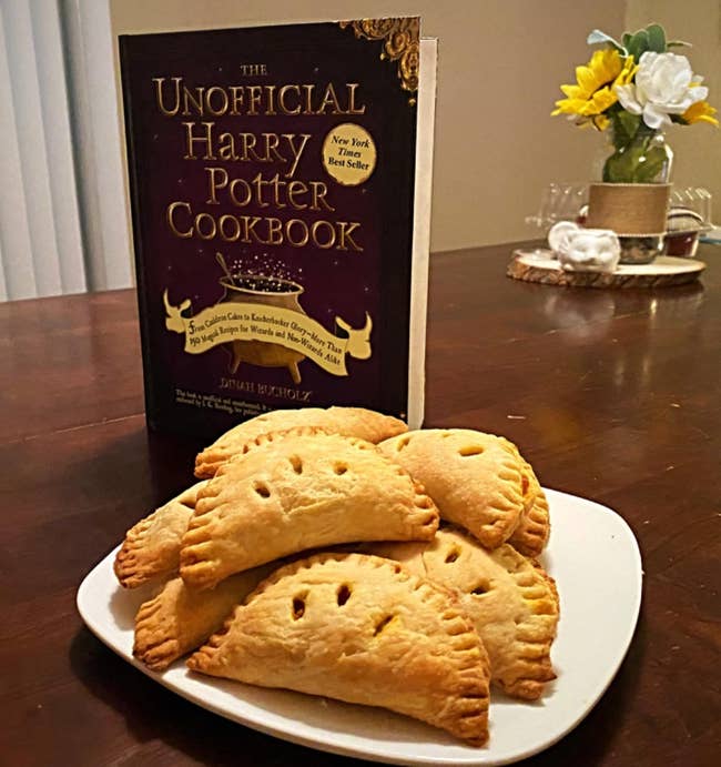 Reviewer's hand pies in front of cookbook