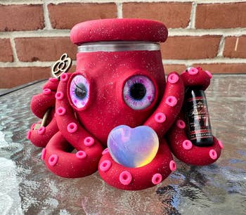 Decorative octopus-shaped jar with heart detail, ideal for unique home accents