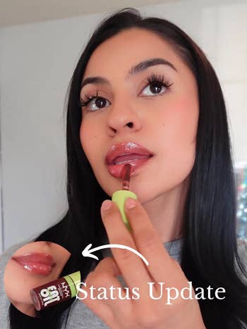 A person applies shiny lip gloss with a small inset showing the product's close-up. The text reads,
