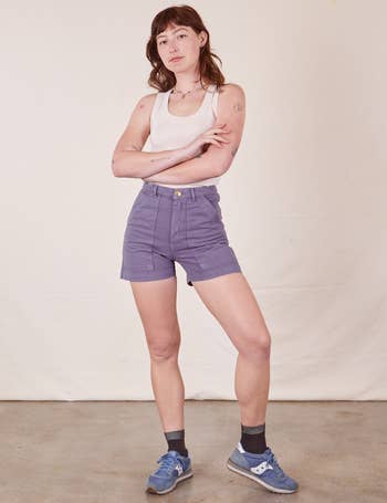 Model wearing grape colored shorts 