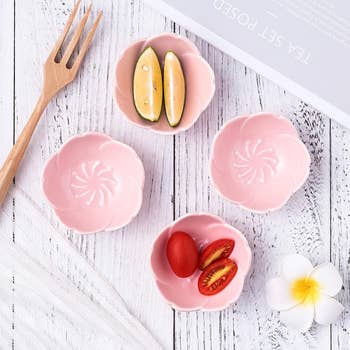 four pink cherry blossom dishes 