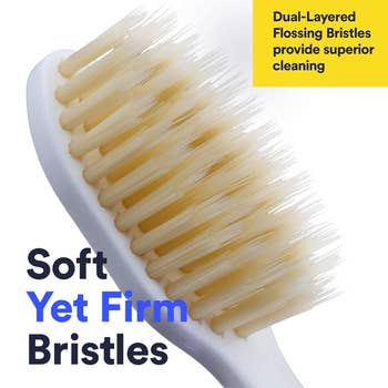 Toothbrush close-up highlighting dual-layered bristles for flossing and cleaning with substance   describing features