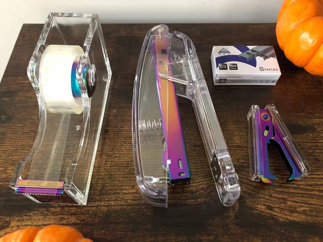 a reviewer shows the tape holder, stapler, and stapler remover