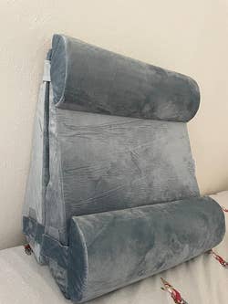 reviewer's four-piece gray wedge pillow set from the front