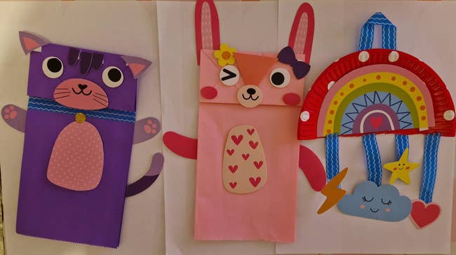 a purple cat, a pinkish canine with hearts, and a rainbow with a cloud, suitable for children's crafting