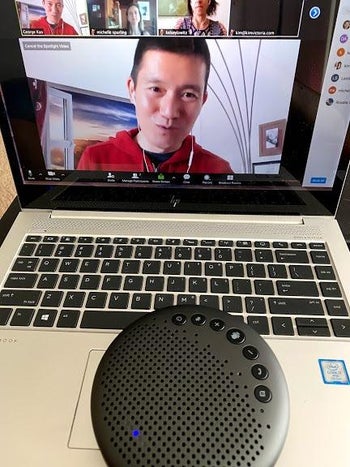 the bluetooth speakerphone on a laptop during a zoom call