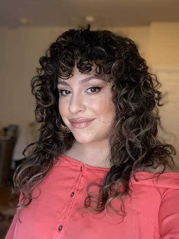 reviewer with beautiful defined curls that aren't flat or frizzy