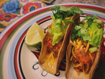 Reviewer image of the tacos with filling inside