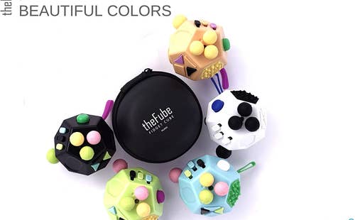 Different colored options of fidget cube and black carrying case