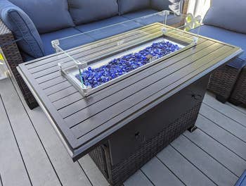 A reviewer's fire pit and patio set in blue