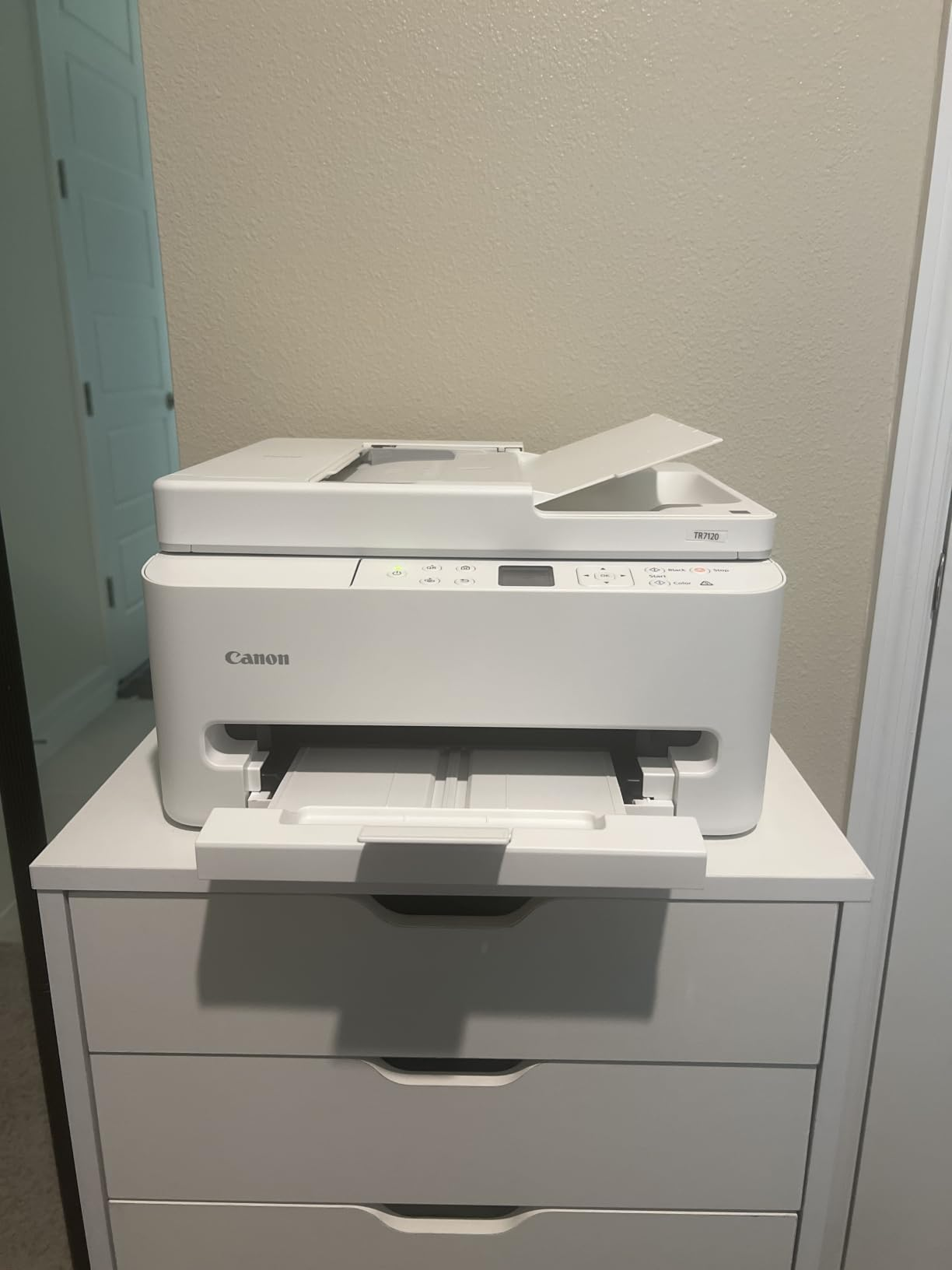 Canon multifunction printer connected  a achromatic  drawer unit, suitable for location  bureau   use