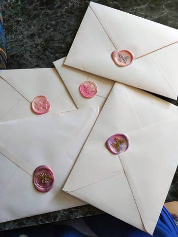 several envelopes sealed with the colored waxes