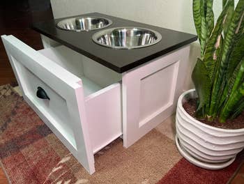 side view showing how the drawer pulls out to store dog food