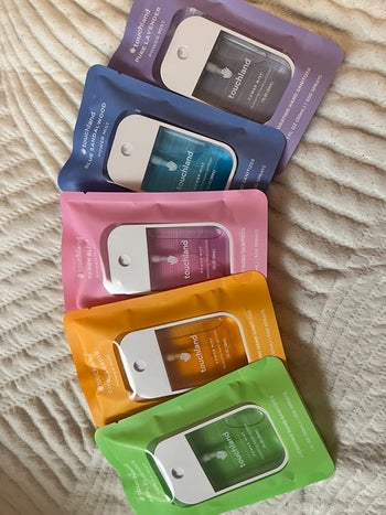 reviewer photo of the five hand sanitizers in the set